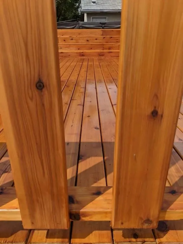 Close view of cedar posts and decking boards with visible grain